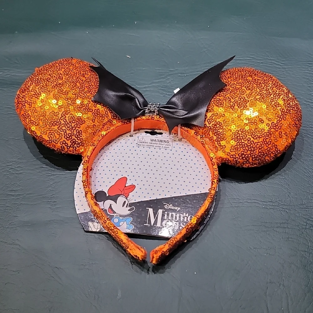 **Disney Sparkling Orange Minnie Ears with Black Bow**